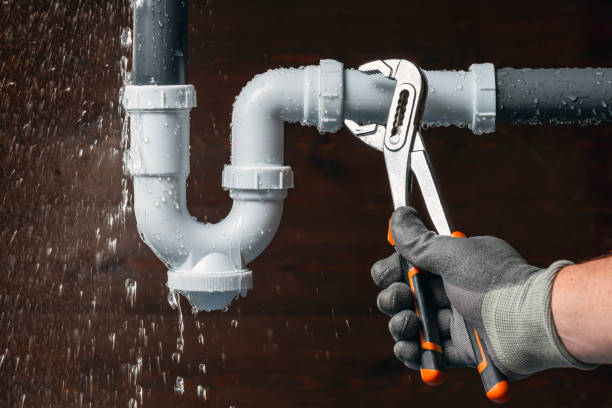 Professional Plumbing technician working in Montchanin, DE